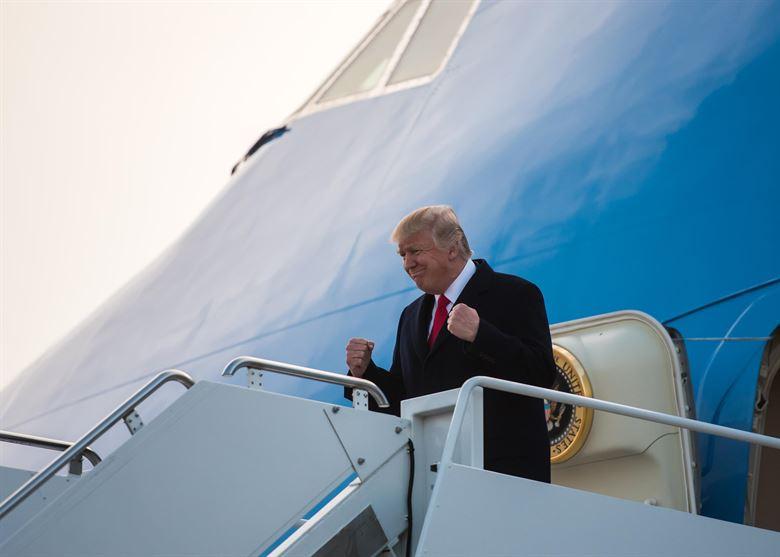 US President Donald Trump debarks from Air Force One. Illustrative. US President Donald Trump debarks from Air Force One. Illustrative.